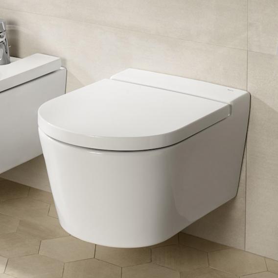 ROUND - Vitreous china Rimless wall-hung WC with horizontal outl